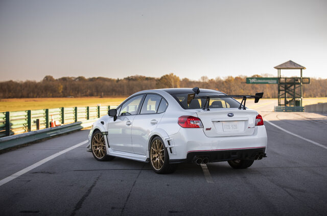 2019 Subaru WRX STi S209, rear three-quarter static at VIR with timing tower