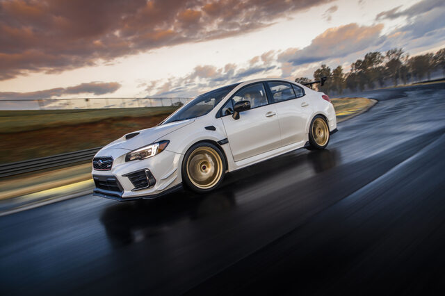 2019 Subaru WRX STi S209, front three-quarter action at speed with sunset light