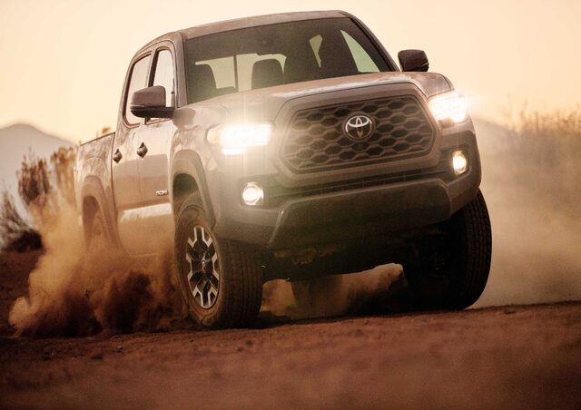2020 Toyota Tacoma TRD Off-Road Front Action Shot in Desert Dust