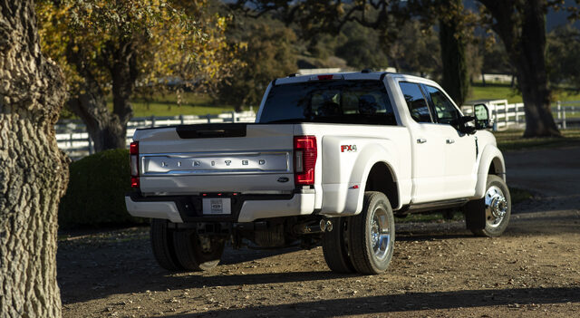 2020 Ford F-Series Super Duty Limited, rear three-quarter view on farm lane