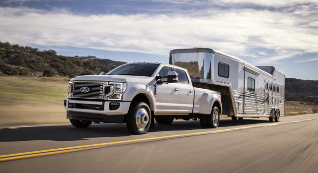 2020 Ford F-Series Super Duty Limited, towing a horse trailer at speed