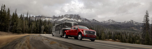 2020 Ford F-Series Super Duty, towing an enclosed trailer in the mountains
