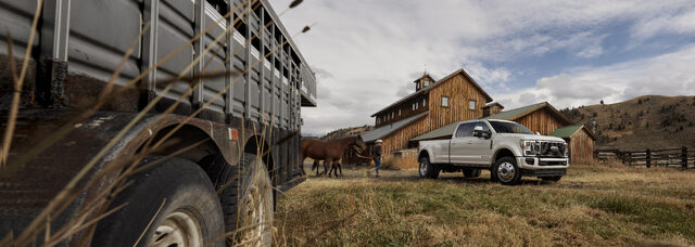 2020 Ford F-Series Super Duty, parked near horse trailer at a farm