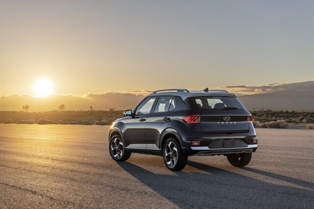 2020 Hyundai Venue SEL rear three-quarter view [golden hour desert]