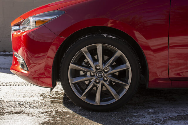 2018 Mazda3 Grand Touring Hatchback Front Wheel and Gunmetal Alloy Wheel Detail