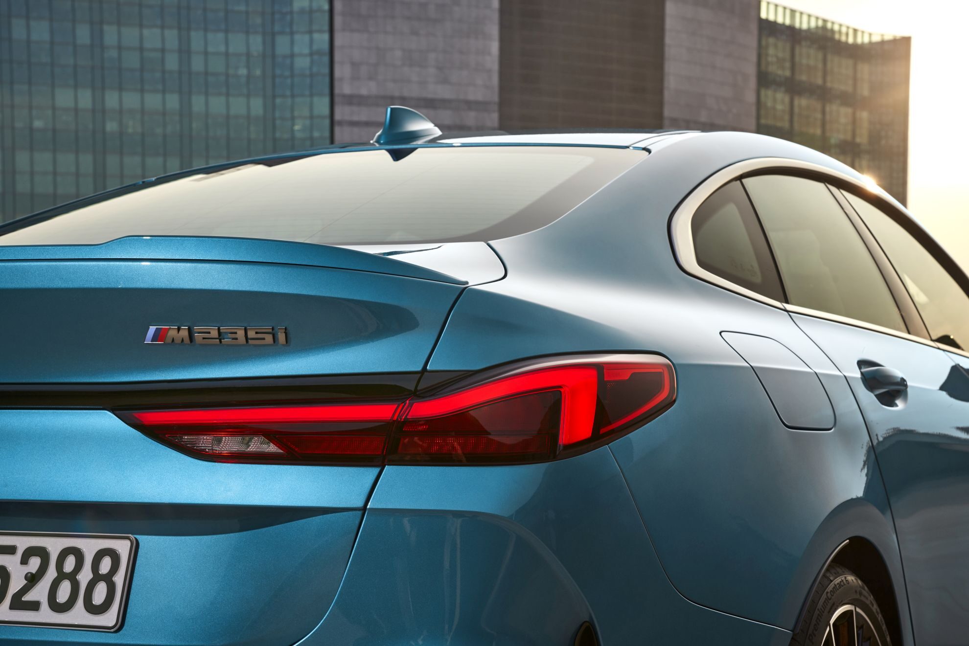 2020 BMW M235i xDrive Gran Coupe driving on a country road