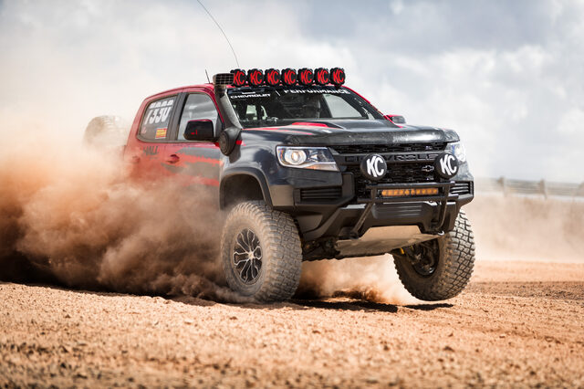 Chevrolet Performance Colorado ZR2-based race truck front three-quarter with KC lights