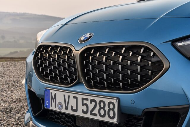 2020 BMW M235i xDrive Gran Coupe rear view parked outside building