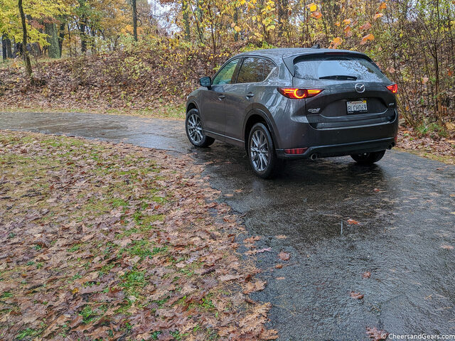 2019 Mazda CX-5 Signature — Rear Three-Quarter, Machine Gray, Wet Pavement