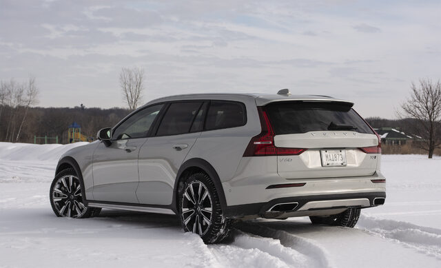 2020 Volvo V60 Cross Country, rear three-quarter view in open snow field