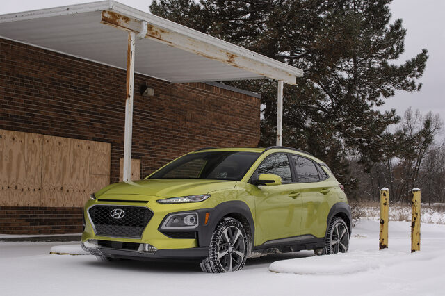 2020 Hyundai Kona Ultimate AWD — Front 3/4 View, Acid Yellow, Snowy Setting