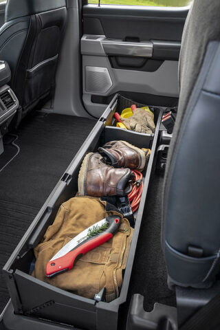 2021 Ford F-150 fold-flat center console creating interior work surface