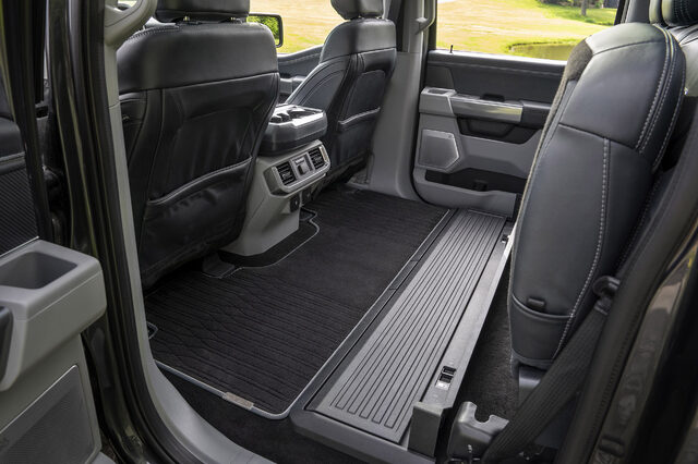 2021 Ford F-150 flat center console used as mobile office workspace