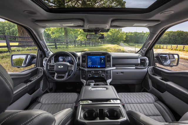 2021 Ford F-150 rear seat folded up revealing flat floor storage