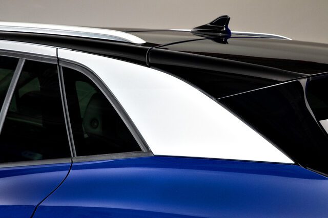 2021 Volkswagen ID.4 roofline and D-pillar detail with panoramic glass