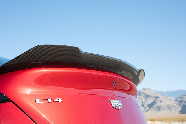 2022 Cadillac CT4-V Blackwing, CT4 trunk badge and carbon fiber spoiler closeup