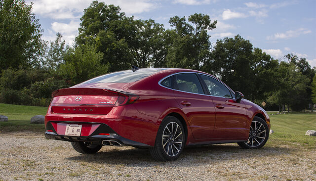 2020 Hyundai Sonata Limited 1.6T rear three-quarter view showing fastback trunk and spoiler