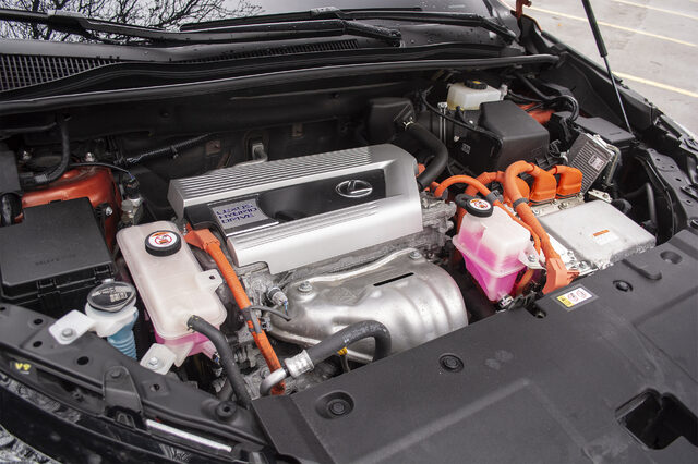 2020 Lexus NX 300h hybrid engine bay with orange high-voltage cables