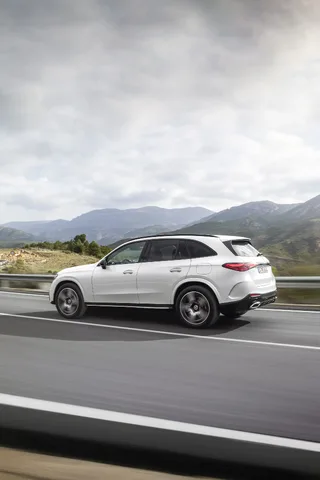 2023 Mercedes-Benz GLC 300 driving rear three-quarter on highway