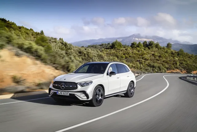 2023 Mercedes-Benz GLC 300 driving front three-quarter on curves