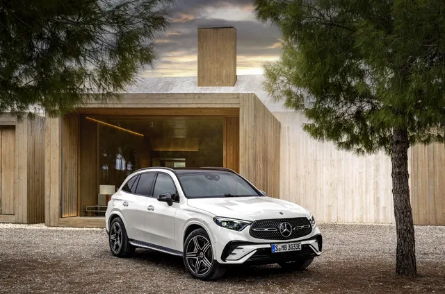 2023 Mercedes-Benz GLC 300 front three-quarter among pine trees
