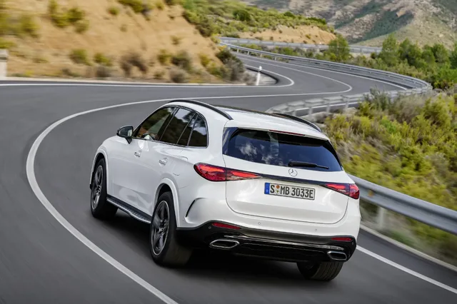 2023 Mercedes-Benz GLC 300 driving rear three-quarter on highway curves