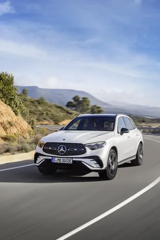 2023 Mercedes-Benz GLC 300 driving front three-quarter on highway
