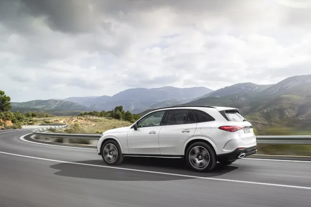 2023 Mercedes-Benz GLC 300 driving rear three-quarter through curves