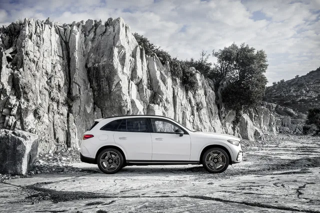 2023 Mercedes-Benz GLC 300 passenger side profile with rock face
