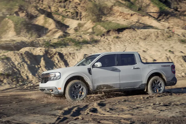 2023 Ford Maverick Tremor muddy off-road action side view