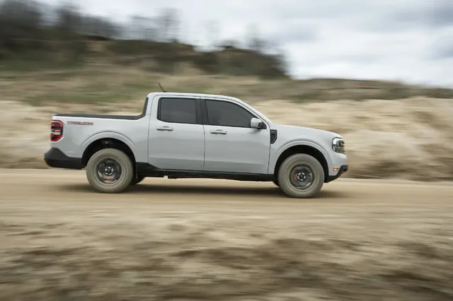 2023 Ford Maverick Tremor passenger side action shot at speed