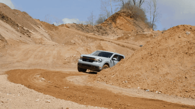 2023 Ford Maverick Tremor cresting dirt hill