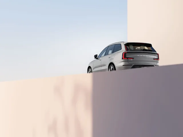 2024 Volvo EX90 Rear View Behind Architectural Wall