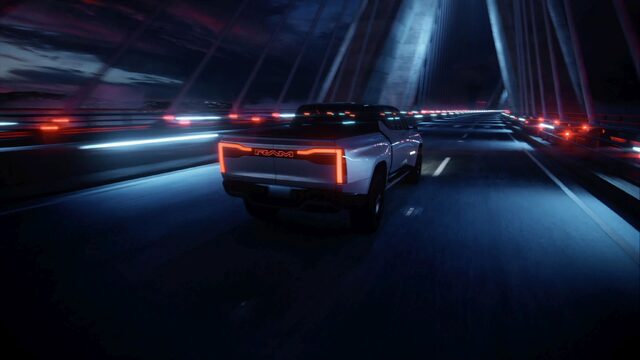 RAM 1500 Revolution Concept Rear Quarter Driving on Bridge