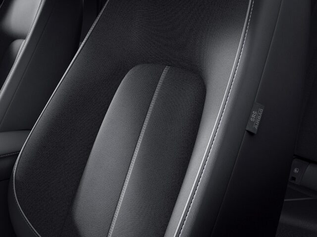 Mazda MX-30 Front Seat Detail in Dark Cloth Upholstery