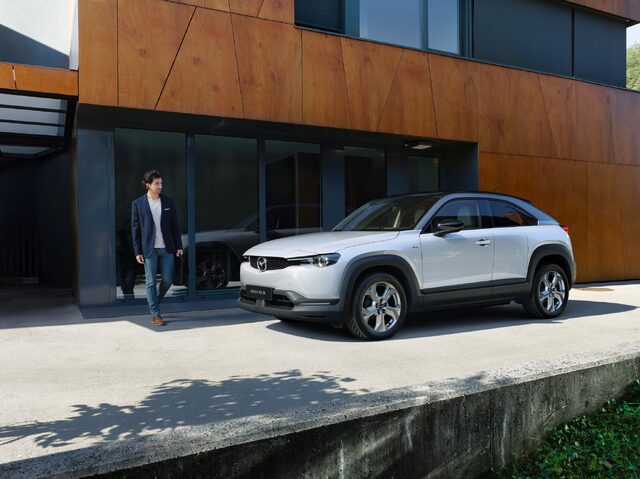 Mazda MX-30 Front Three-Quarter View Outside Modern Building