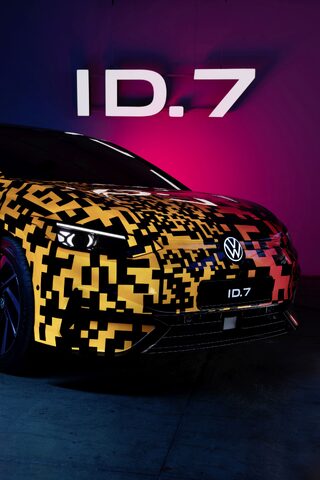 2024 Volkswagen ID.7 Concept front end close-up with yellow camouflage