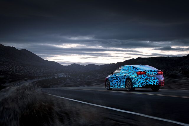 2024 Volkswagen ID.7 Concept driving at dusk on desert road