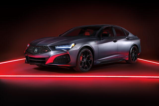 2023 Acura TLX Type S PMC Edition front three-quarter studio with red lighting