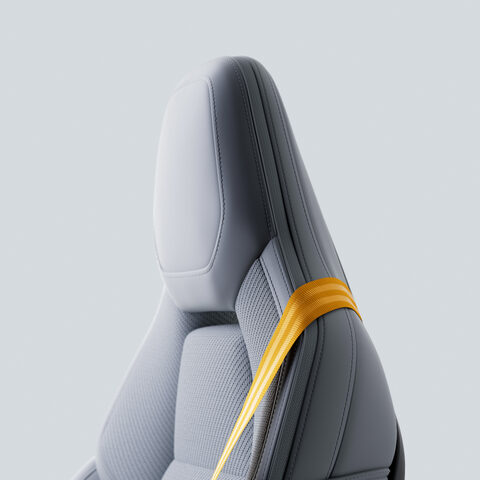 Polestar 4 Front Seat Detail with Gold Seatbelt