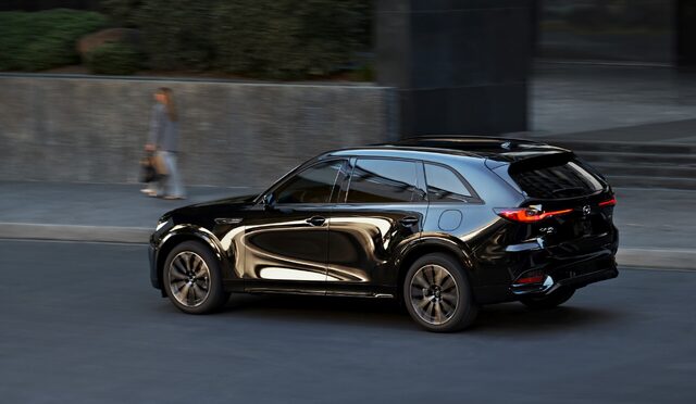 2025 Mazda CX-70 rear three-quarter driving at night