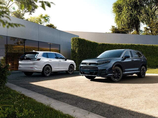 2025 Honda CR-V e:FCEV Two-Tone White and Blue Pair in Driveway