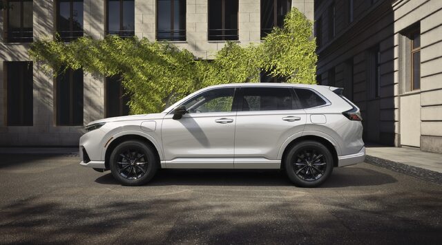 2025 Honda CR-V e:FCEV White Side Profile on City Street