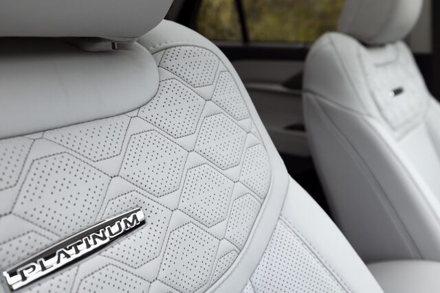 2025 Ford Explorer Platinum seat bolster with Platinum badge closeup