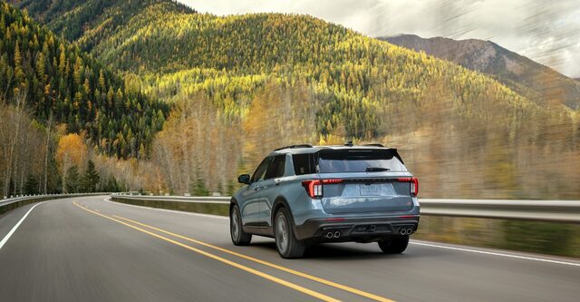 2025 Ford Explorer ST rear view driving on a mountain highway
