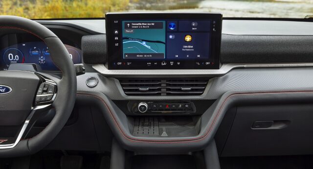 2025 Ford Explorer ST center touchscreen and climate controls with red accent trim