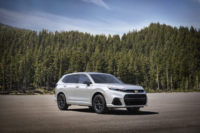 2025 Honda CR-V e:FCEV White Front Three-Quarter with Forest Backdrop