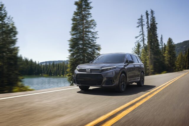 2025 Honda CR-V e:FCEV Gray Driving Along Mountain Lake