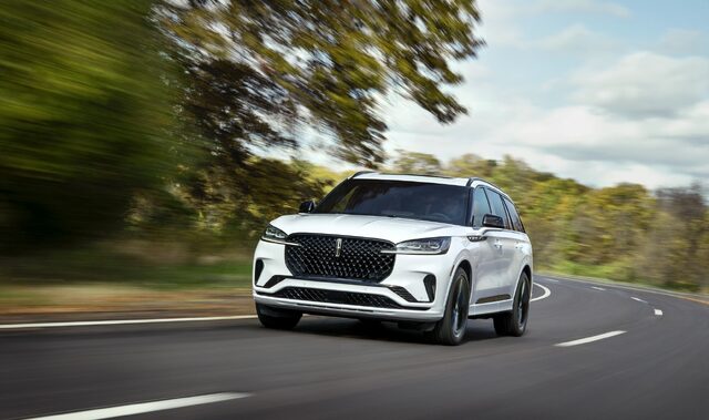 2025 Lincoln Aviator front action shot on curved road