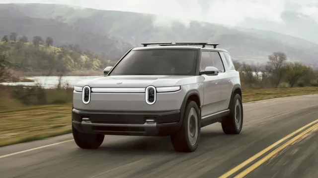 2026 Rivian R2 Front Three-Quarter Driving on Open Road